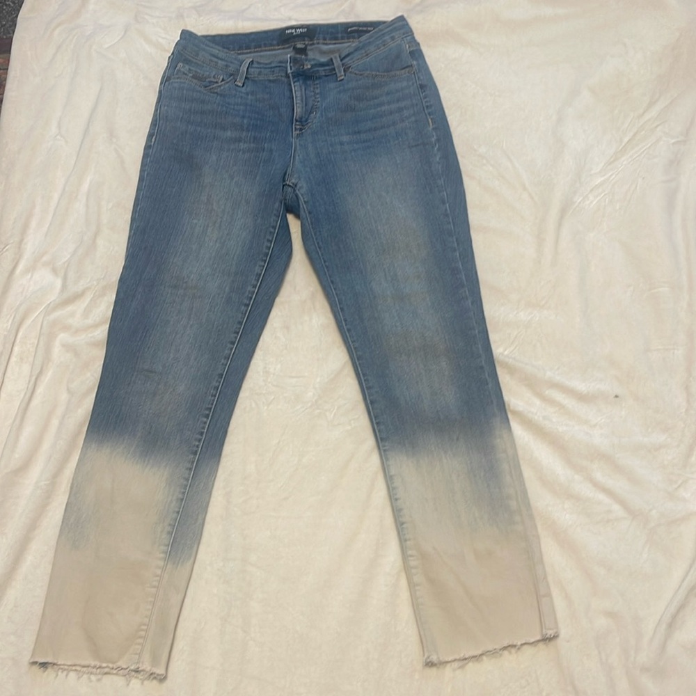Cute Nine West jeans with two tone graduated bleached bottom frayed area. Size 4